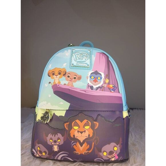 Loungefly Handbags - SOLD-NWT Loungefly POP Disney Lion King Pride Rock Mini Backpack